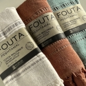 Fouta en coton biologique coloris AMBRE, tissée avec une face éponge, franges nouées à la main